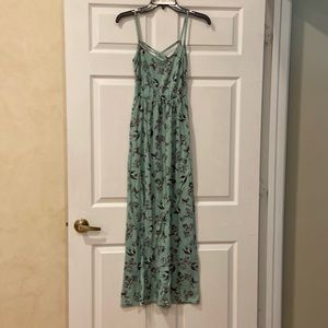 Green maxi dress with black and white birds